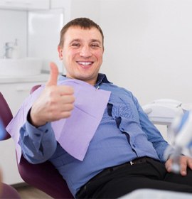 nitrous oxide dental sedation candidate in Brampton giving a thumbs up
