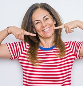 woman showing off smile