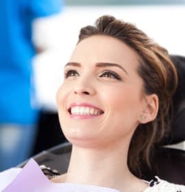 woman smiling in dental chair