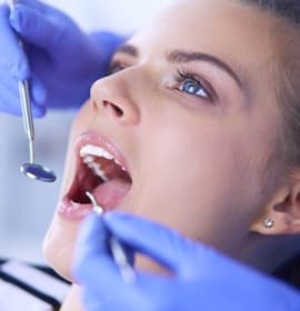 woman getting dental checkup