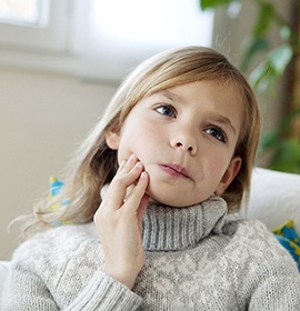 Child visiting Brampton emergency dentist