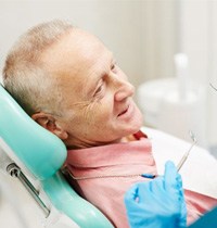 a patient visiting their dentist for a checkup 