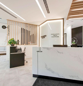 Four Brampton dentists smiling at Salvaggio Dentistry