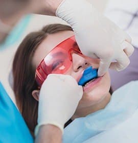 Patient receiving fluoride treatment