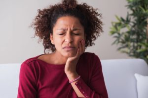 woman experiencing dental pain