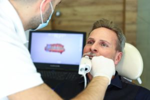 man having mouth digitally scanned