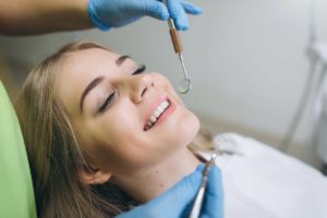 Patient reclined in dental chair