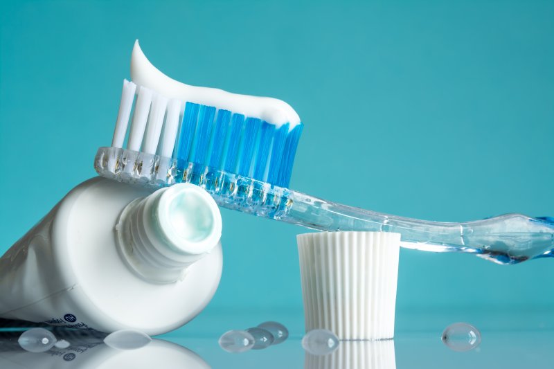 Toothpaste slathered on a toothbrush