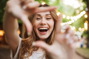 a young adult with a beautiful smile